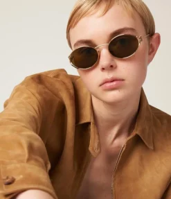 Miu Miu Oval Sunglasses in Brass Gold