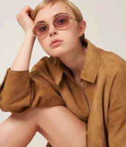 Miu Miu Oval Sunglasses in Gold